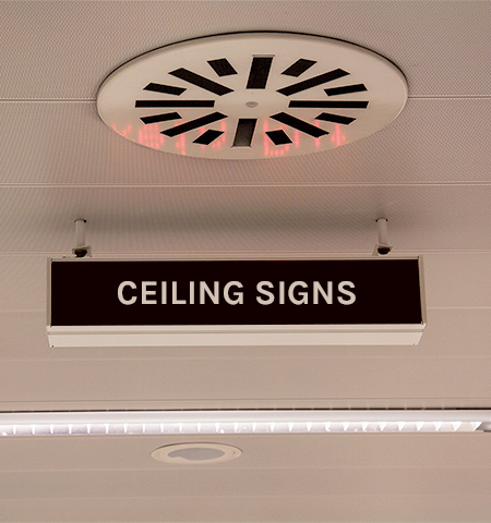 Enhancing Navigation and Safety with Ceiling Signs - Scoops Moon